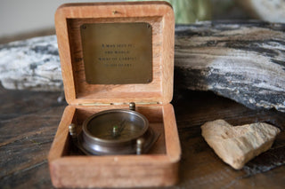 Tripod Compass in A Man Sees Wooden Box
