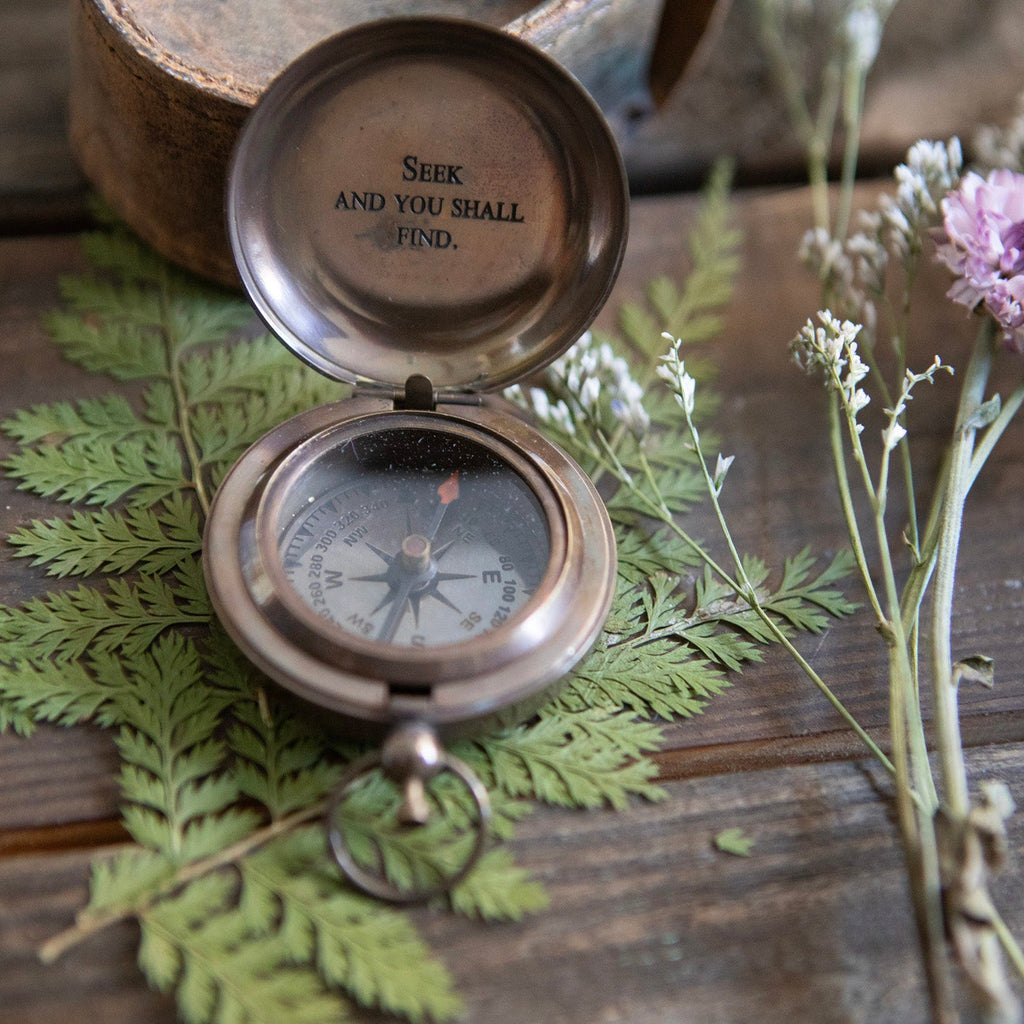 Seek and You Shall Find Push Button Compass with Leather Pouch
